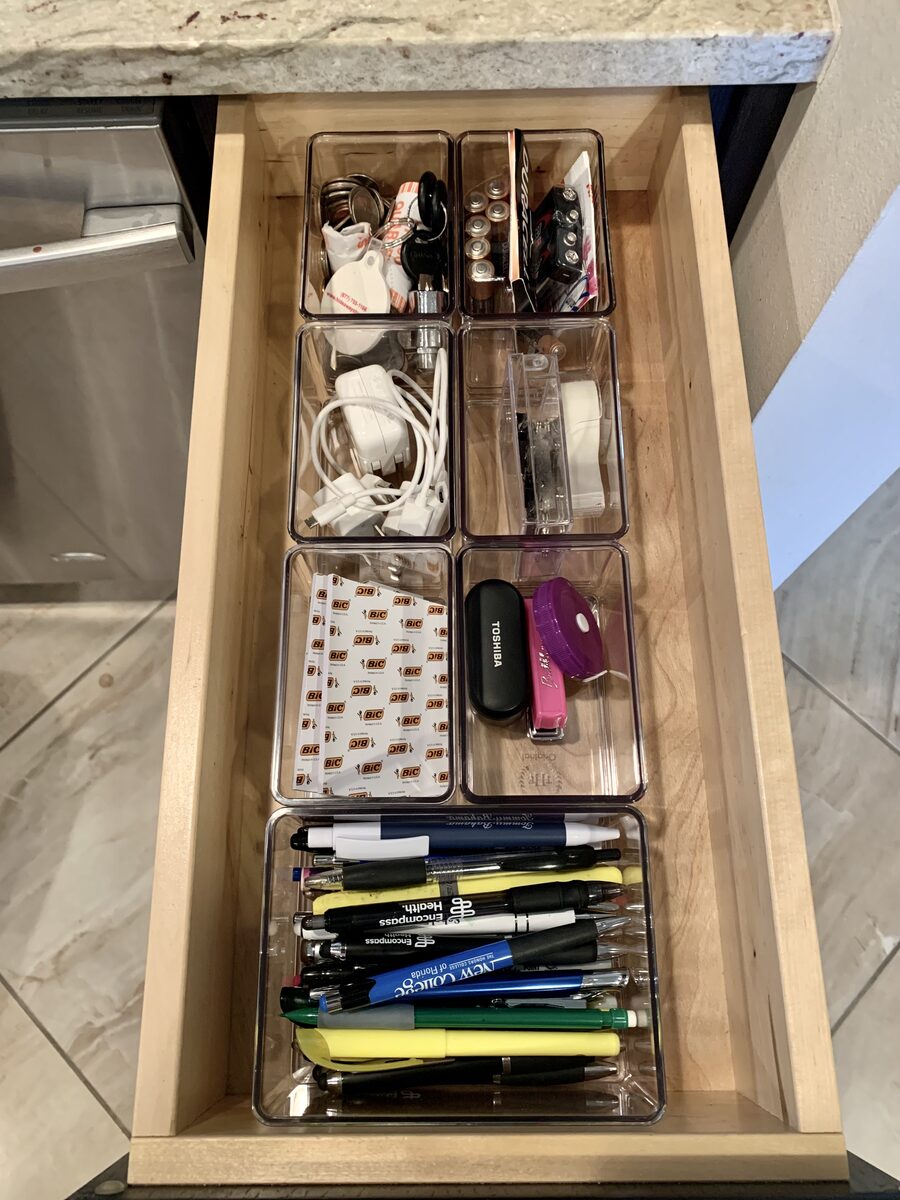 Home office desk drawer organized with dividers and labeled sections — Simply Spacial Sarasota
