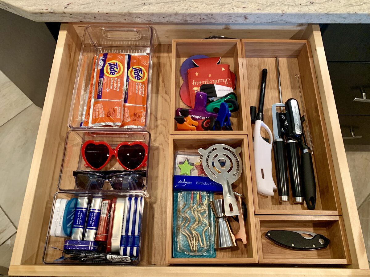 Kitchen catch-all drawer tamed with custom organizer inserts — Simply Spacial Sarasota FL