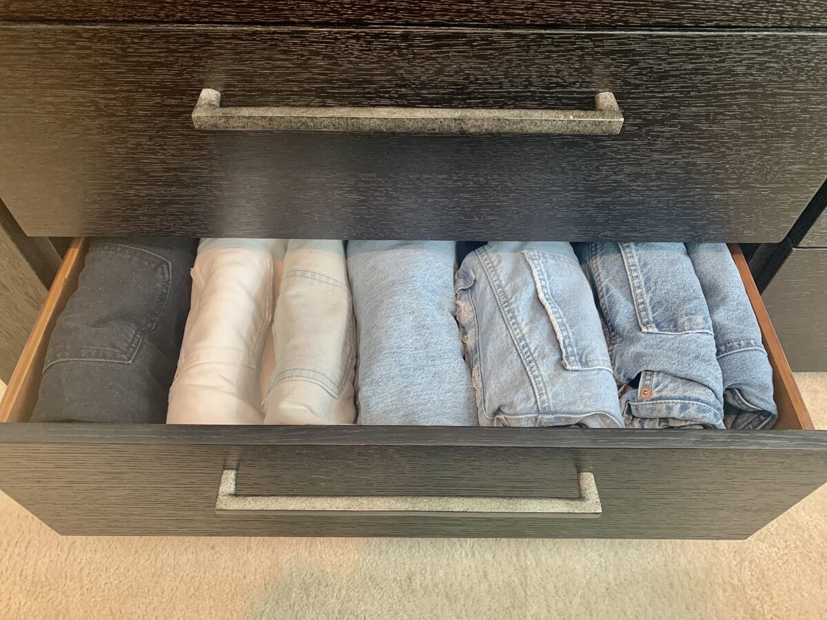 Denim jeans folded vertically using the file-fold method — Simply Spacial closet organizing, Sarasota