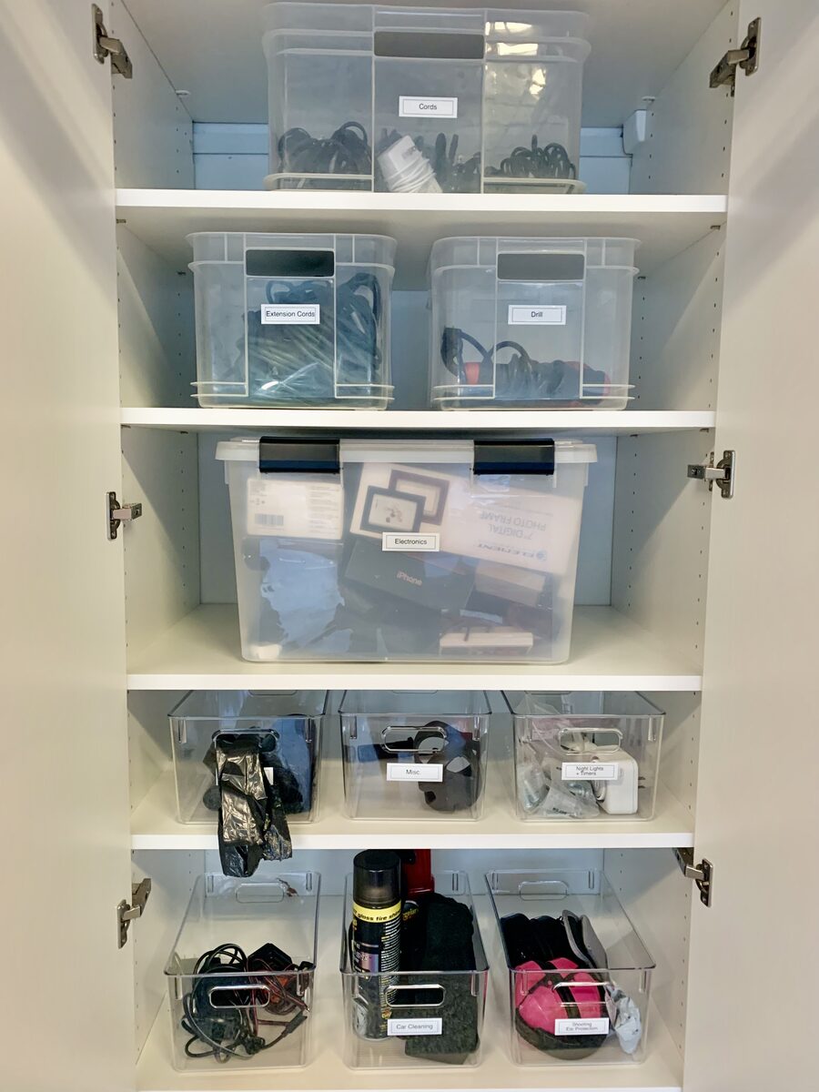 Home utility cabinet organized by category with labeled zones — Simply Spacial Sarasota FL