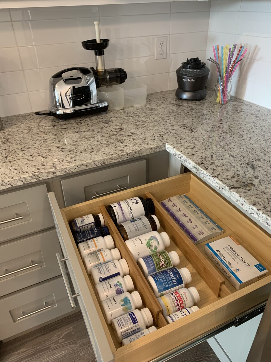 Vitamins and supplements sorted into a labeled daily organizer — Simply Spacial Sarasota FL