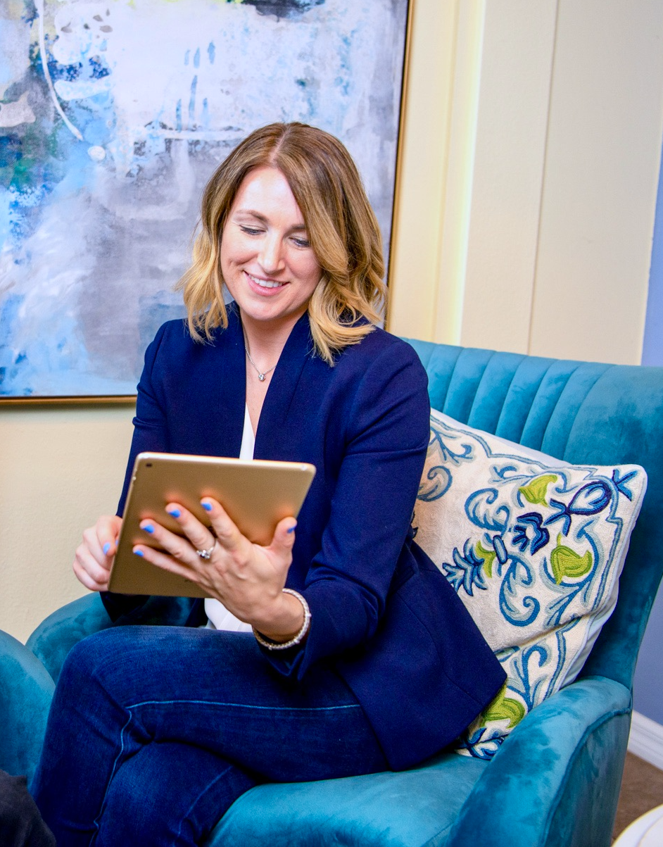 Kim working with a tablet